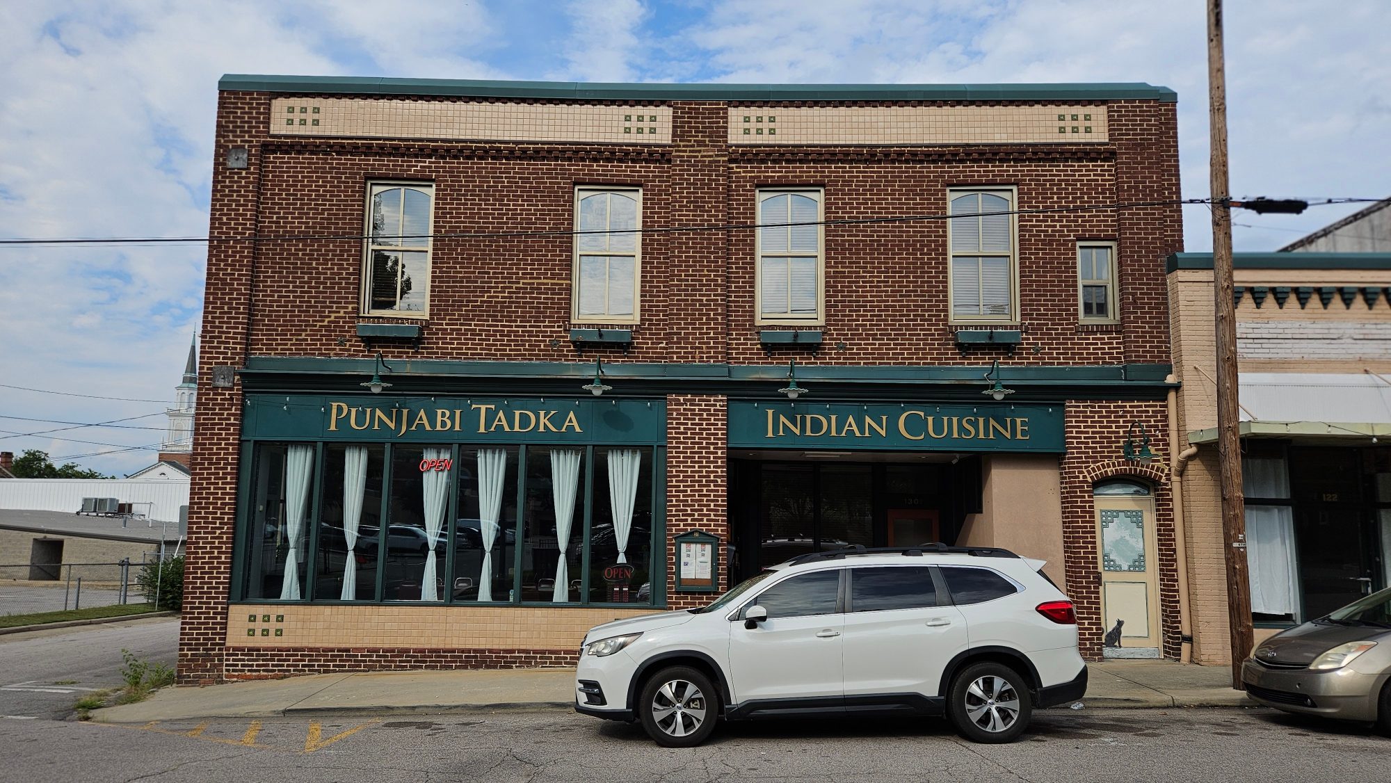 The Punjabi Tadka Indian Cuisine storefront on West Montgomery Street in downtown Henderson